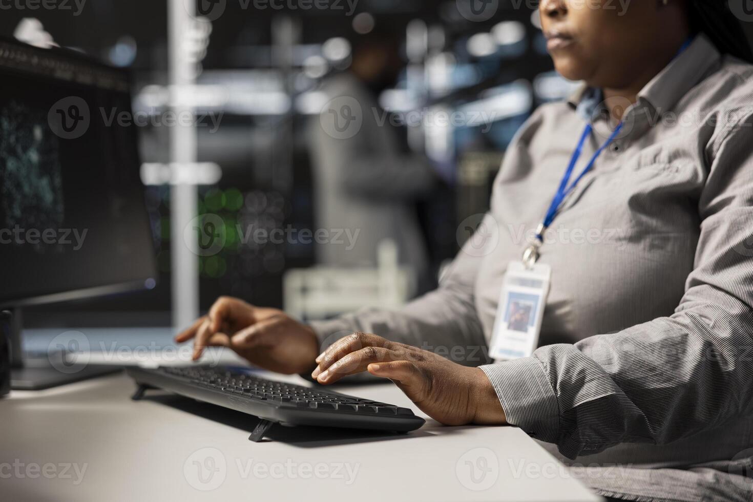 Close up of data center programmer coding, writing script on PC identifying bottlenecks. Server farm IT specialist typing on compute keyboard, troubleshooting computer bugs, implementing optimizations photo