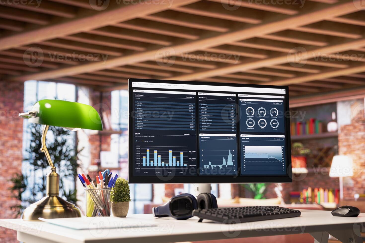 Financial software UI on PC screen on apartment office desk showing revenue and expenses. Accounting annual review on computer monitor in bright cozy living room showing profits photo