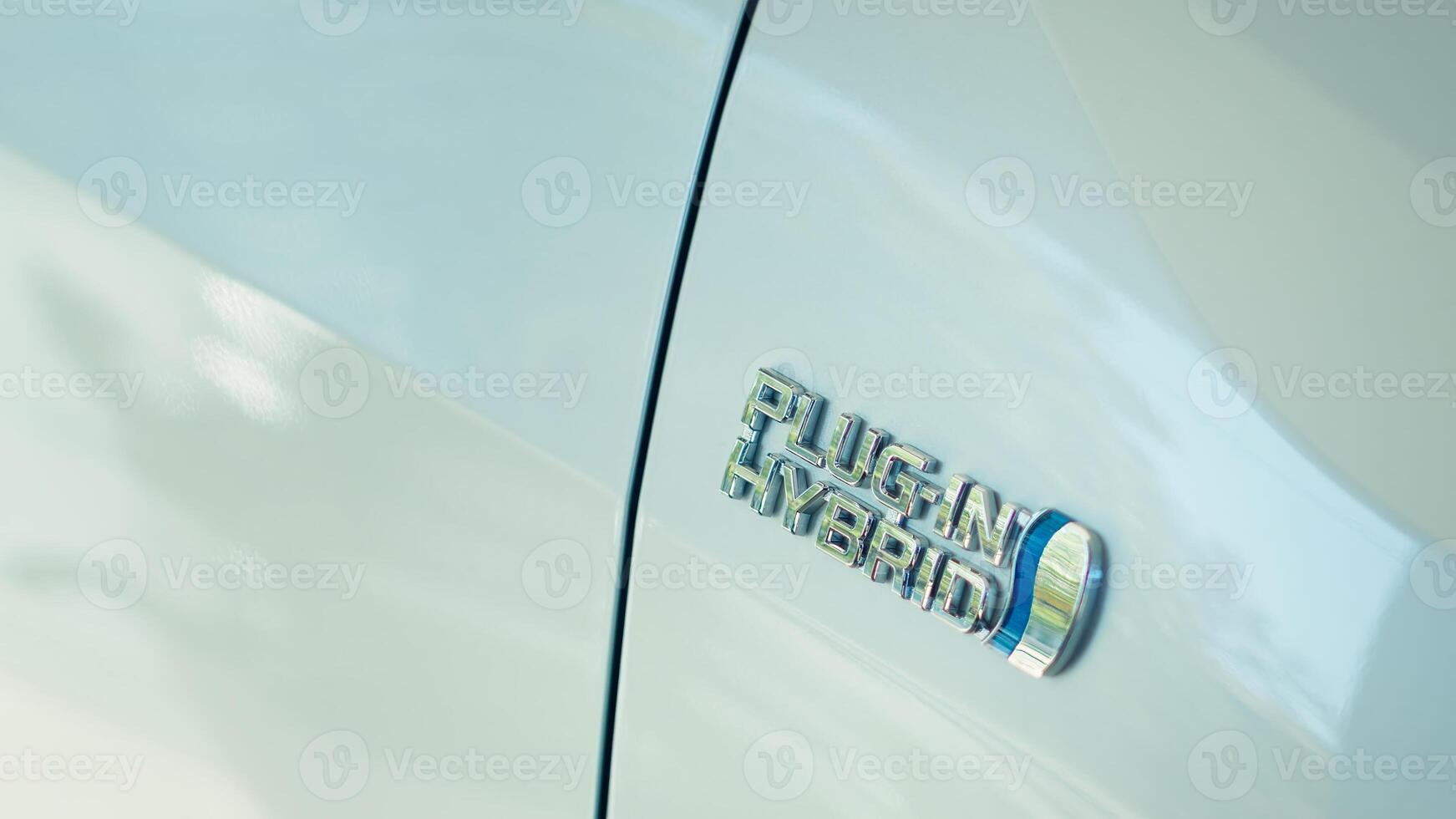 Plug in hybrid electric vehicle combining electric motor with combustion engine, allowing PHEV to drive in electric only mode for certain distance. EV car prioritizing performance and sustainability photo