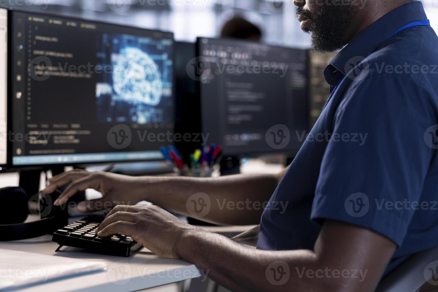 Software developer reconfiguring neural networks server farm to optimize it for data processing requirements. Machine learning specialist ensuring data center operates efficiently photo