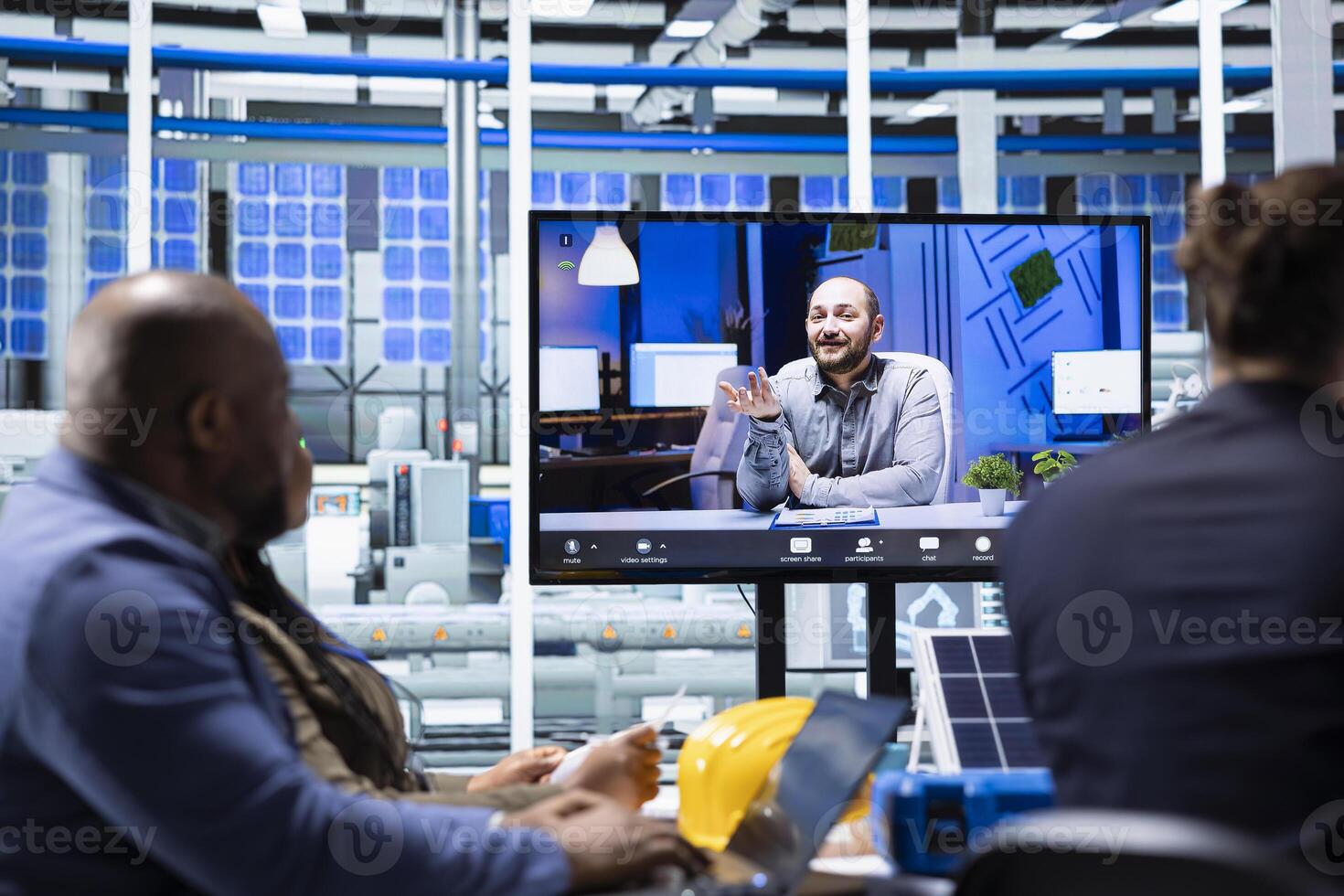 Investors evaluating solar panels manufacturing plant production during internet videocall before investing. Shareholders doing remote videoconference with managers to ask technical questions photo