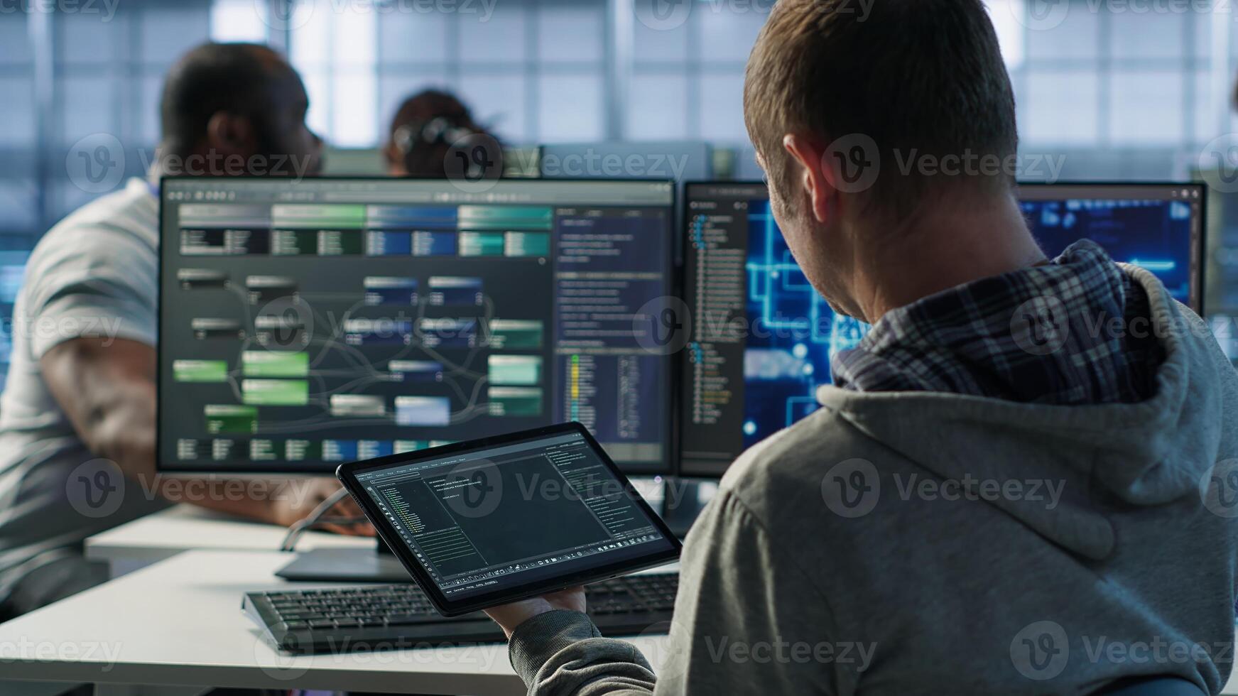 Computer scientist in data center uses artificial intelligence neural networks doing computing processes. IT specialist working on tablet with AI machine learning algorithms, camera A photo