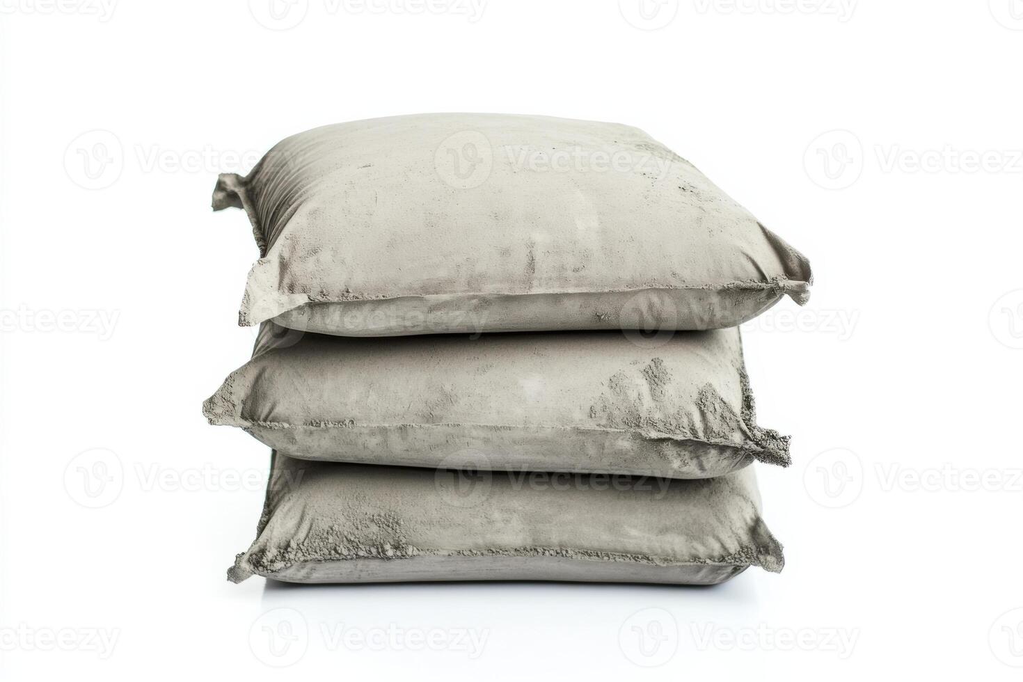 High quality cement bags stacked on clean white background with ample empty space for design purposes photo