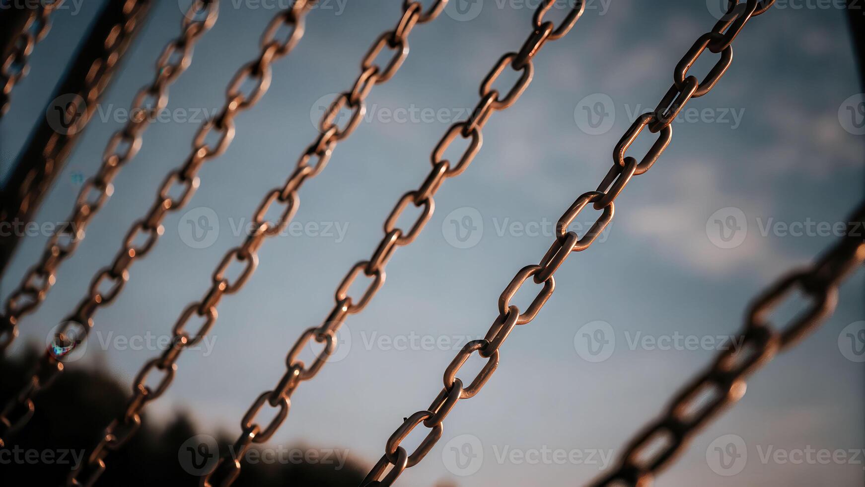 Fire performer swinging flaming chains in nighttime street performance motion blur capturing energy photo