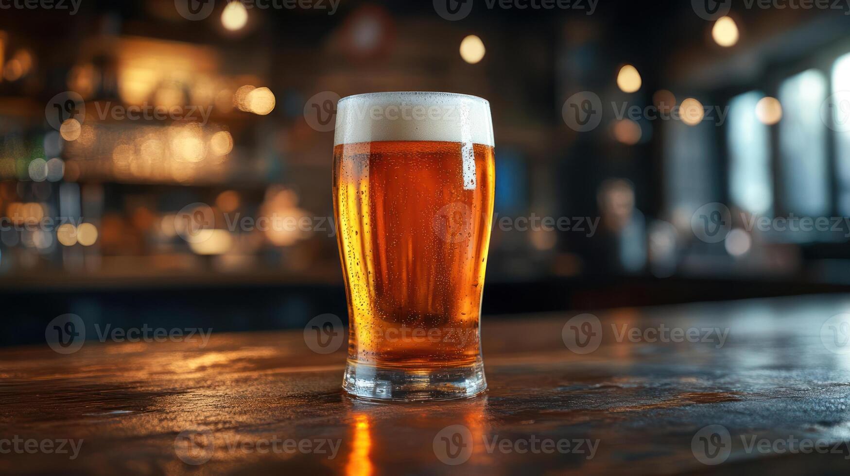 Refreshing pint of beer on a wooden surface. photo