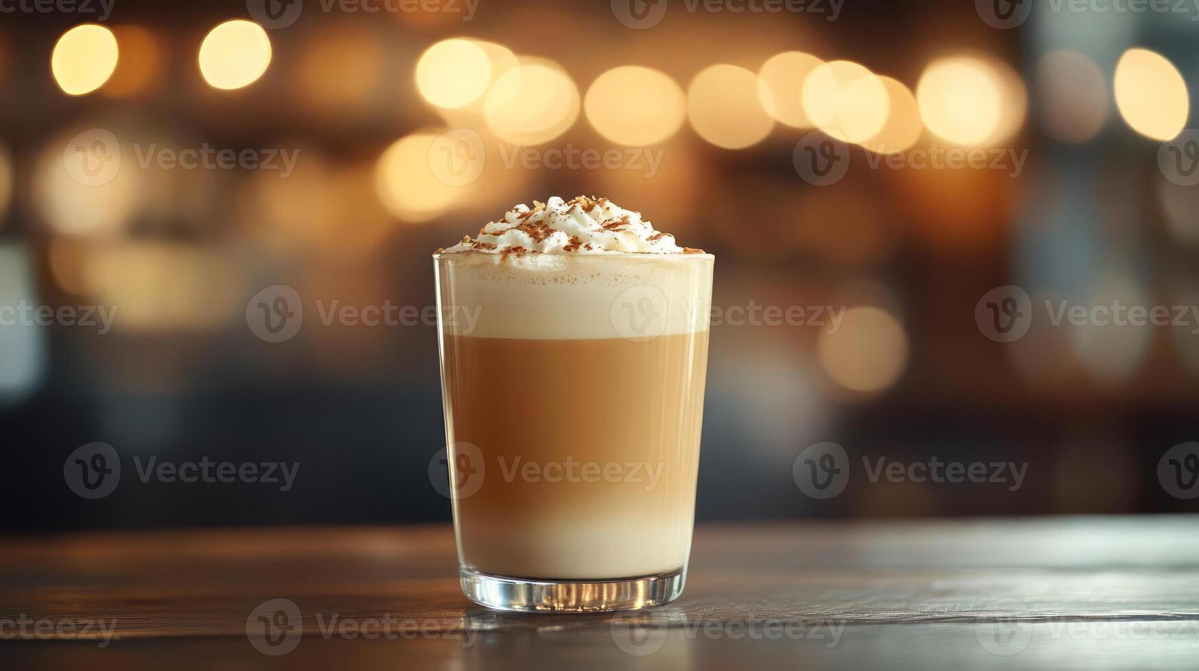 Creamy coffee drink with whipped cream, bokeh background. photo