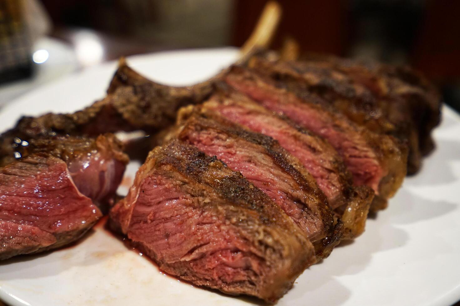 Close up grilled medium rare T bone steak photo