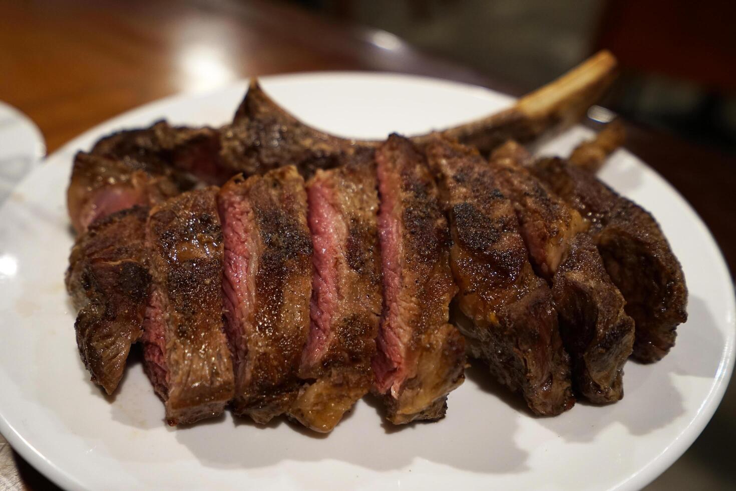 Close up grilled T bone steak photo
