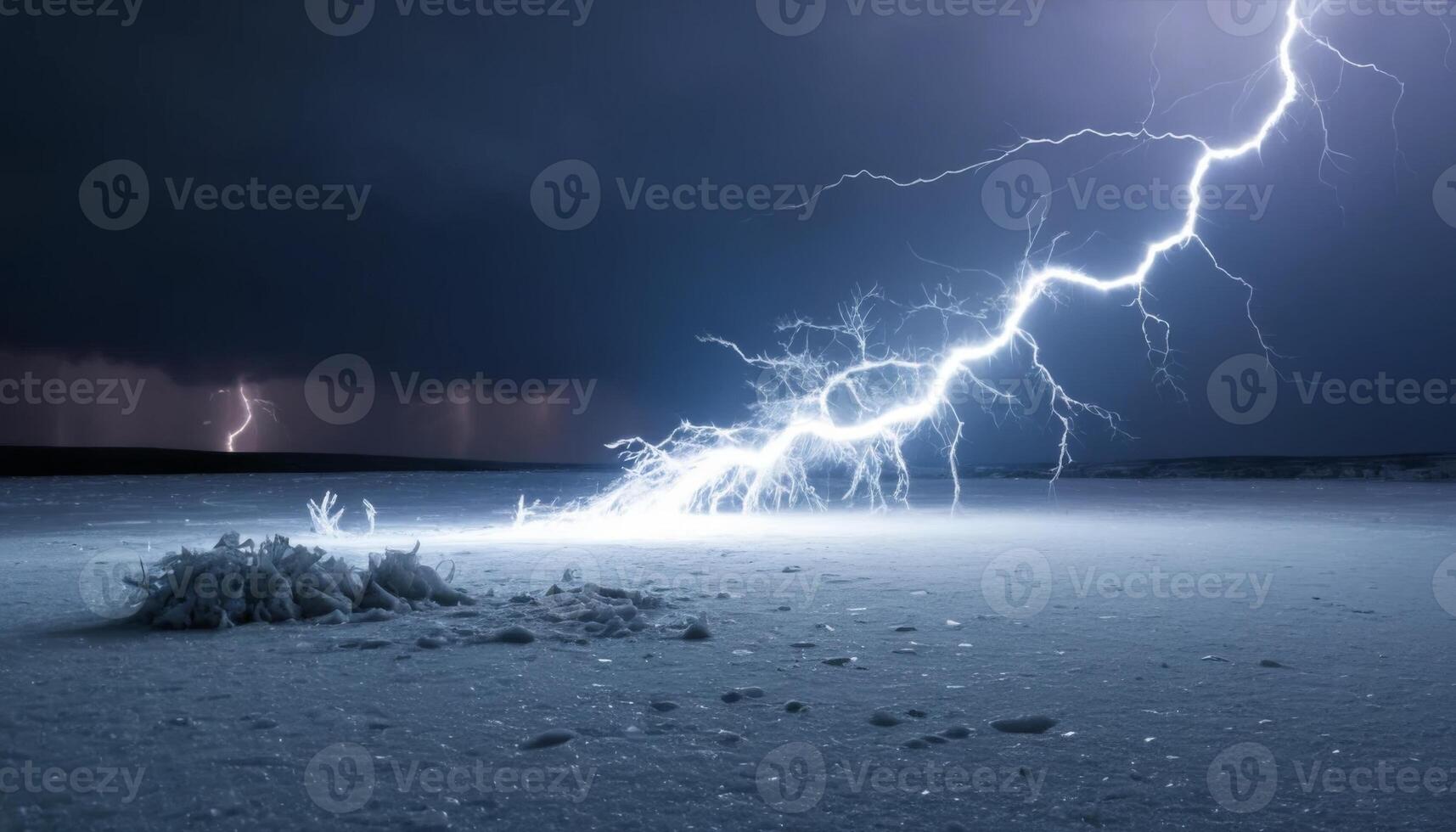 Dramatic Lightning Strike Illuminates Dark Sky Over Snowy Landscape with Natural Energy Display and Atmospheric Tension photo