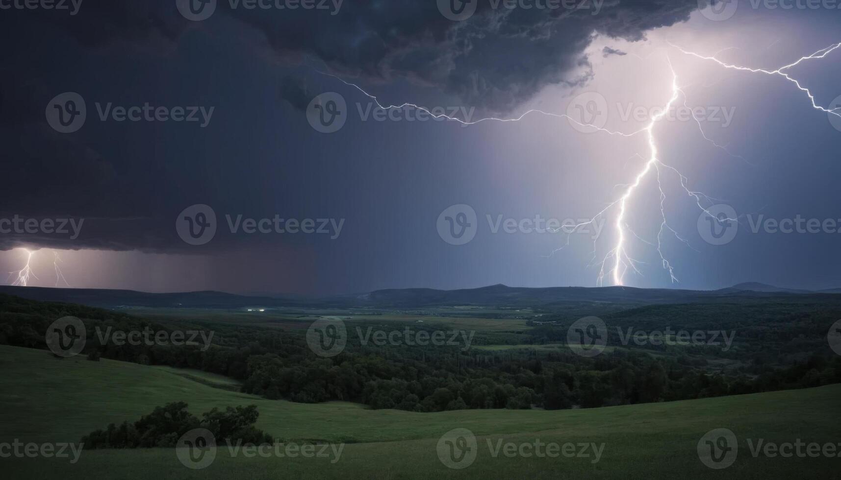Dramatic Thunderstorm Over Green Valley with Striking Lightning Illuminating Dark Cloudy Sky at Dusk photo