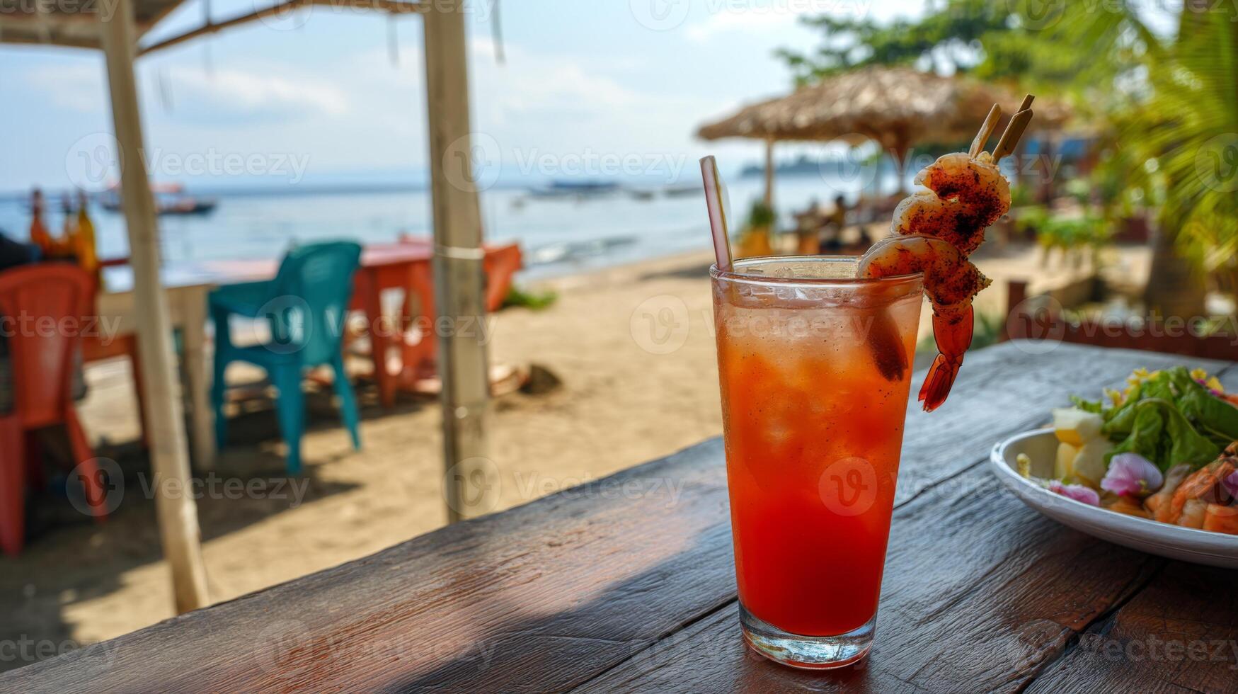 Refreshing Tropical Drink with Seafood Garnish at Beachside Restaurant with Scenic View and Relaxing Atmosphere photo
