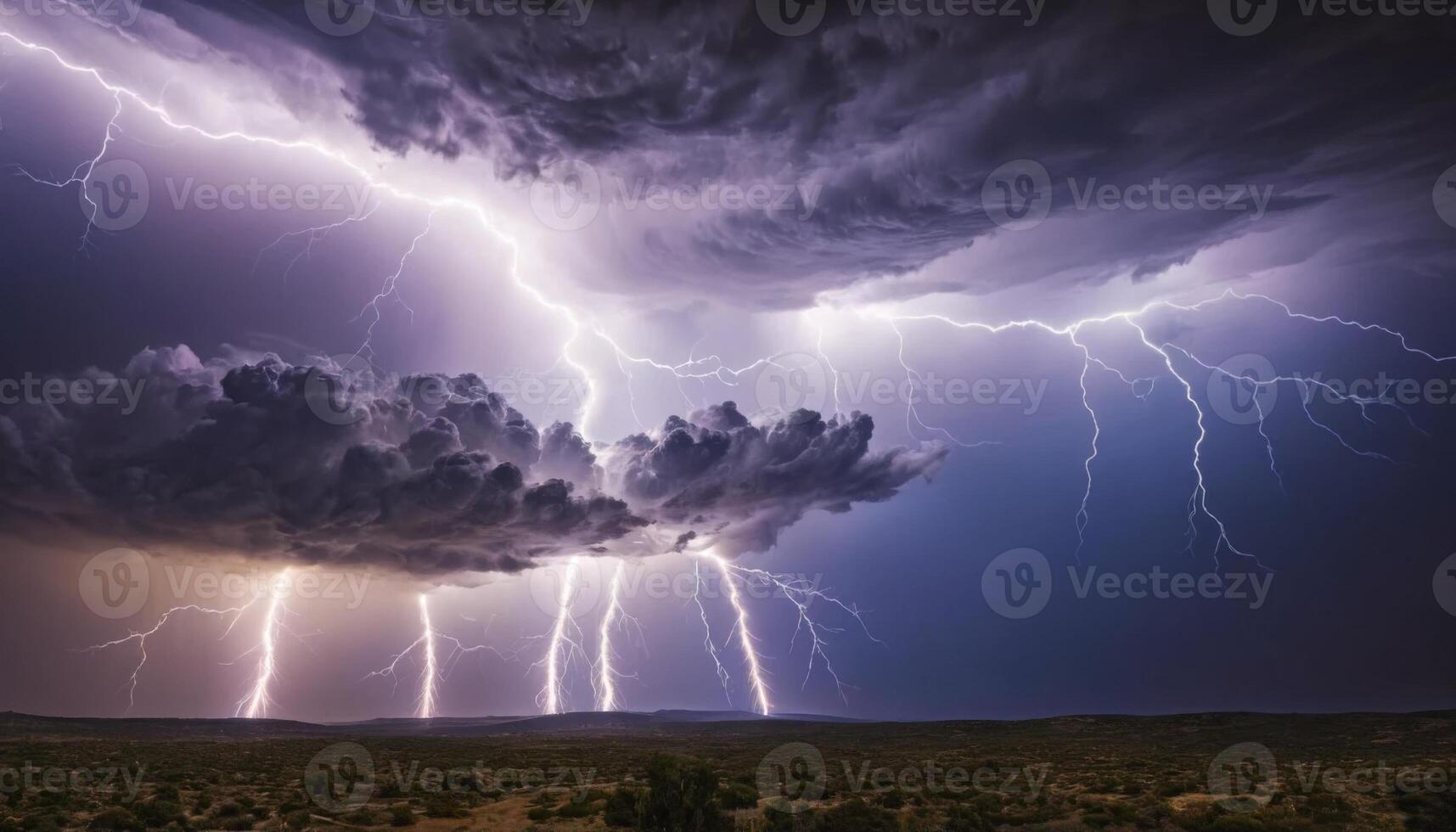 Dramatic Lightning Strikes Illuminate Dark Storm Clouds Over Desert Landscape at Night photo