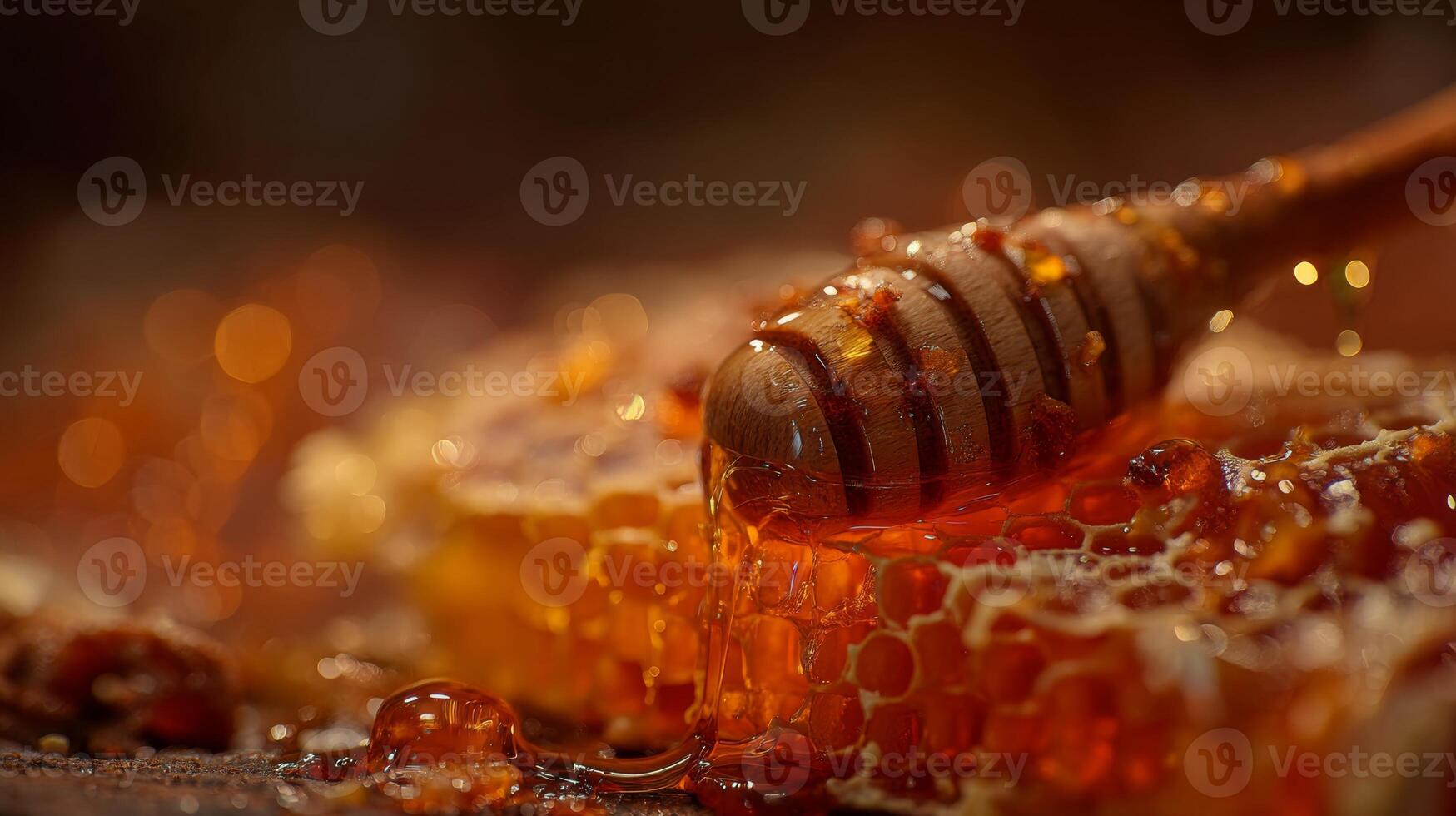 Golden Honey Dripping from a Wooden Dipper Over Honeycomb Surrounded by Sparkling Amber Liquid in a Warm Setting photo
