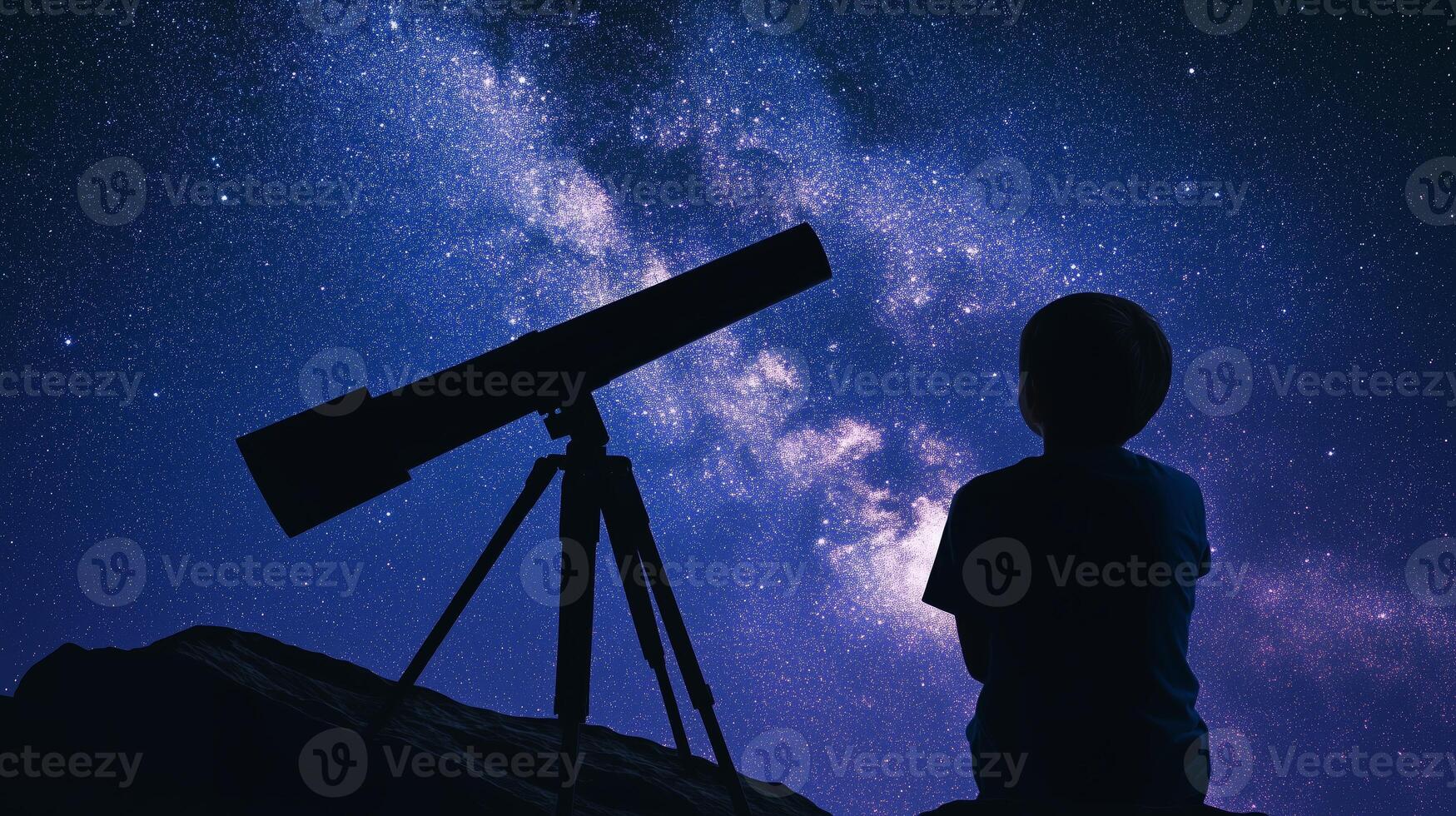 A person gazing at the stars through a telescope photo