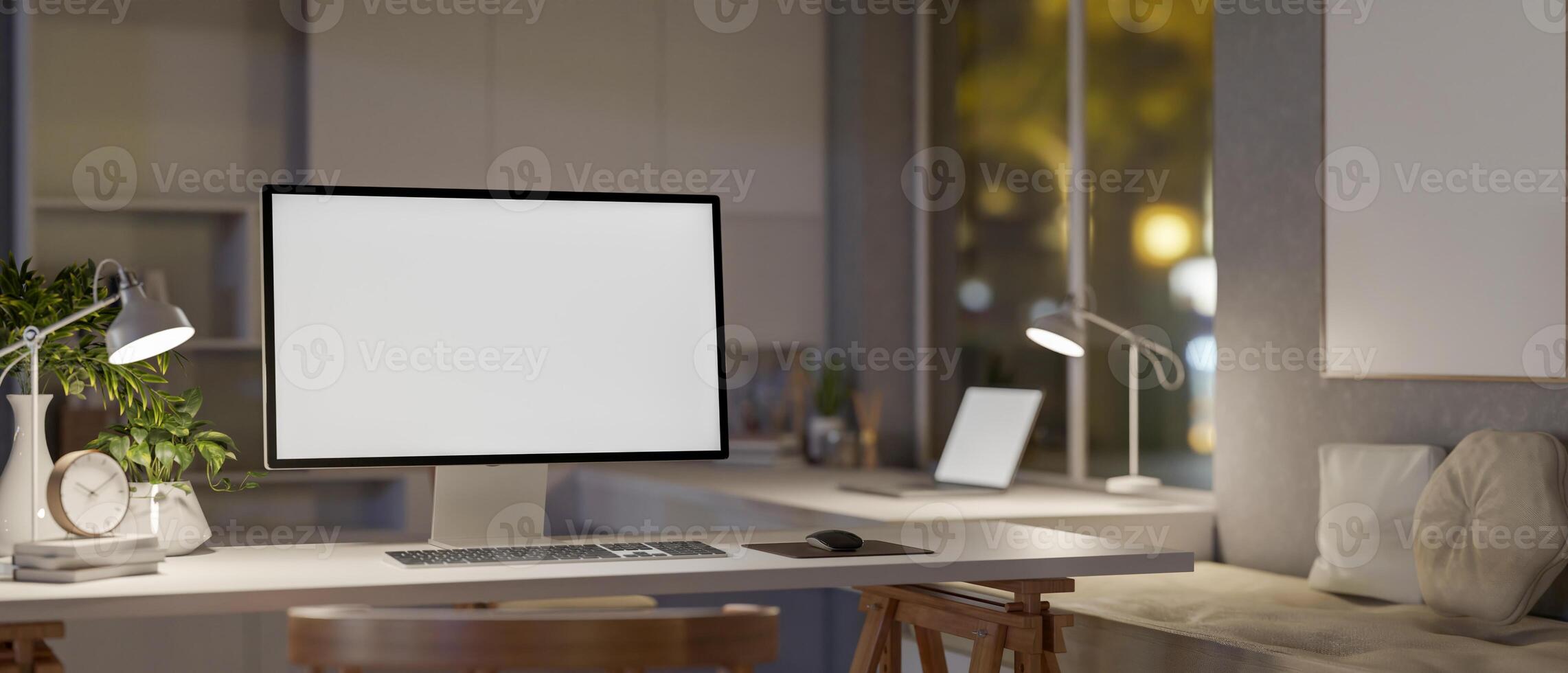 The white screen computer on white table with decorative items, study room or home office idea. photo