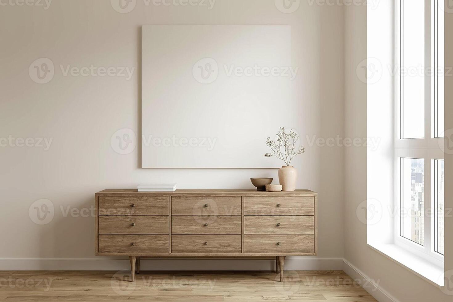 A wooden dresser and a blank canvas in a room with a window photo