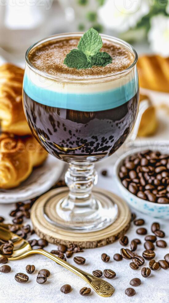 Exquisite layered coffee drink with mint garnish for elegant beverage presentation photo