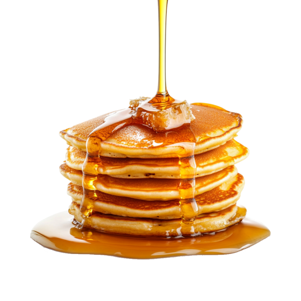 pancakes with syrup being poured over them on a transparent background png