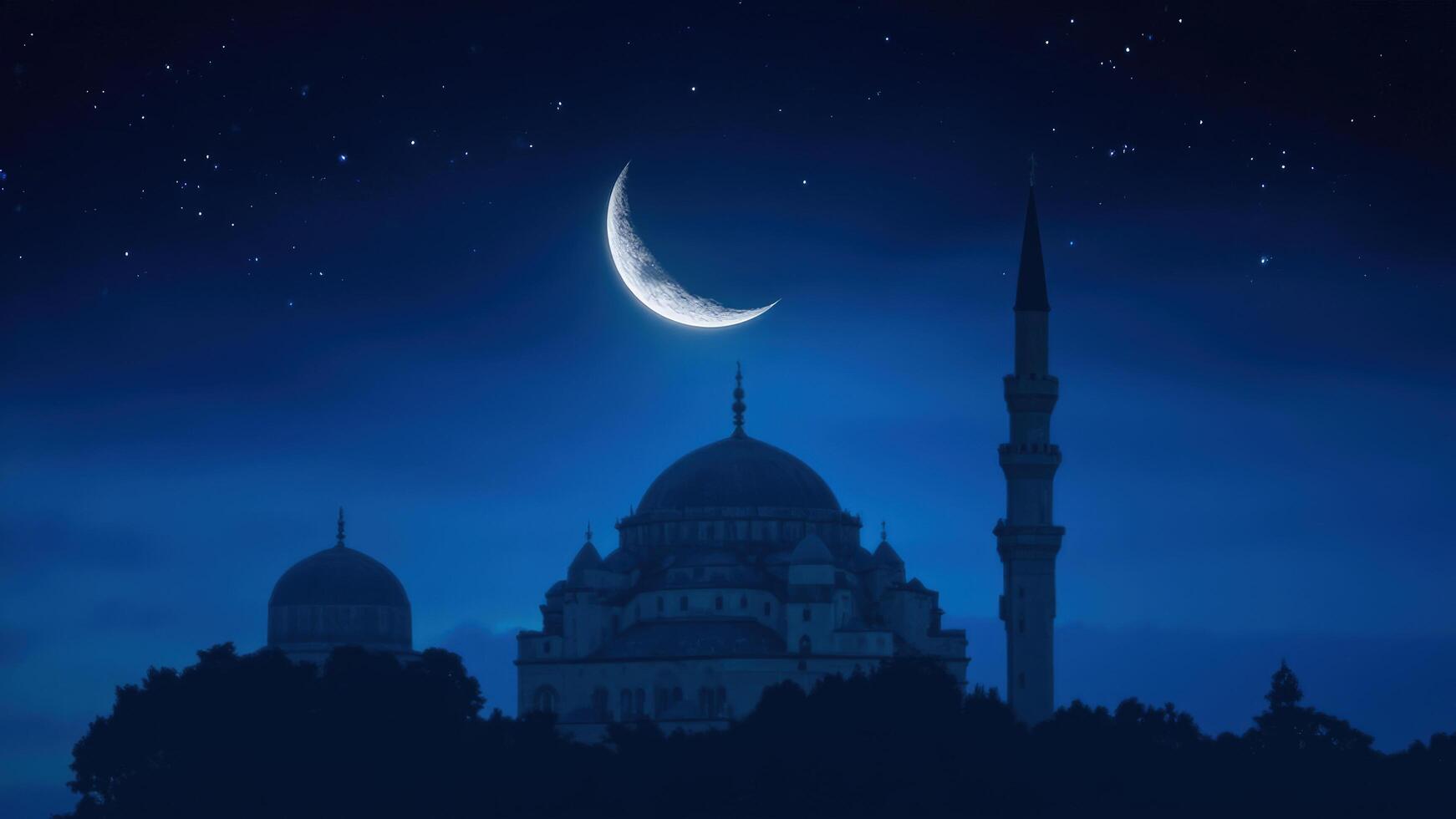 The moon and mosque in the night sky photo
