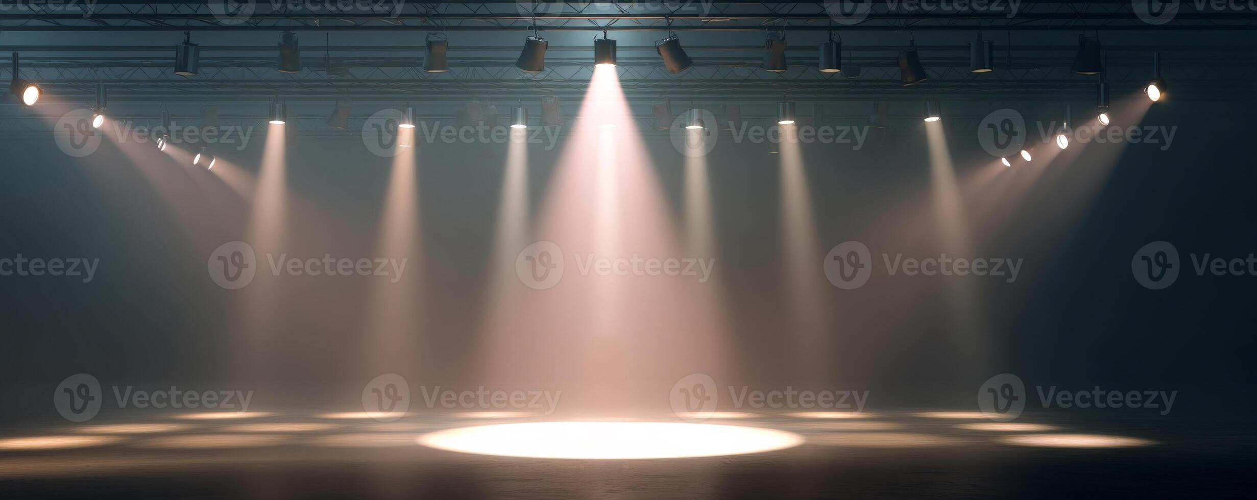Spotlights illuminating an empty stage in a dimly lit theater, moody ambiance photo