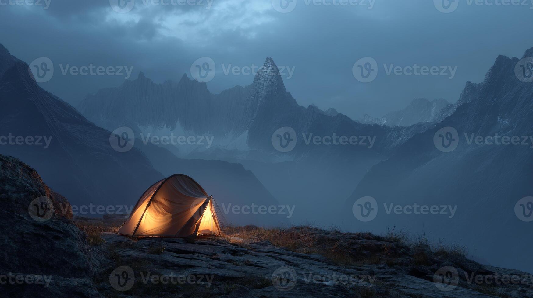 Glowing tent in dark misty mountains under cloudy sky, hiking adventure at night photo