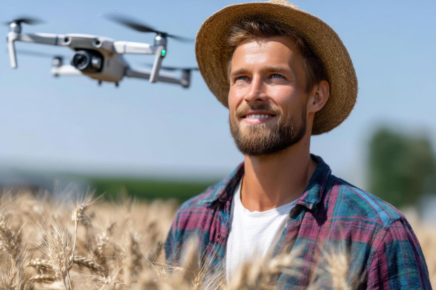 Drone Technology in Modern Agriculture A Happy Farmer Surveys His Wheat Field photo