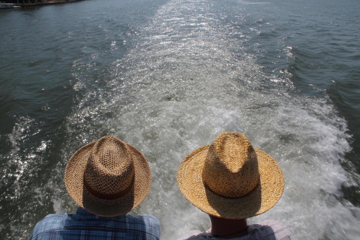 Relaxing Water Journey with Straw Hats photo
