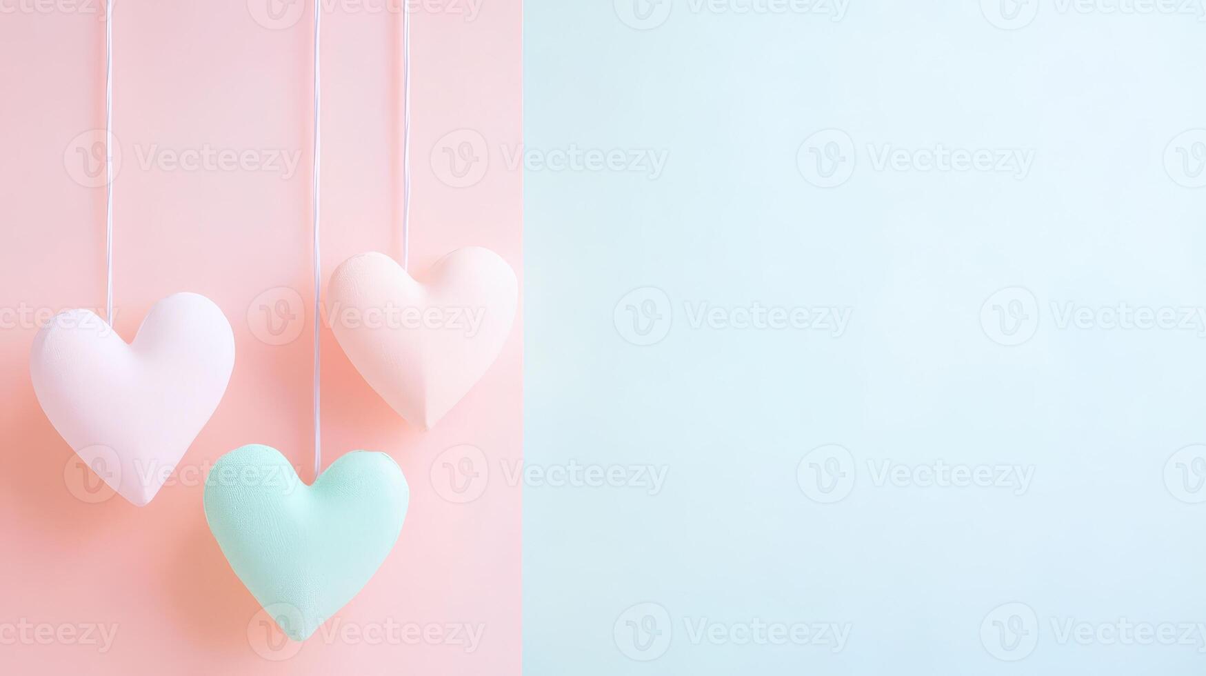 Colorful hearts on a pastel wall photo