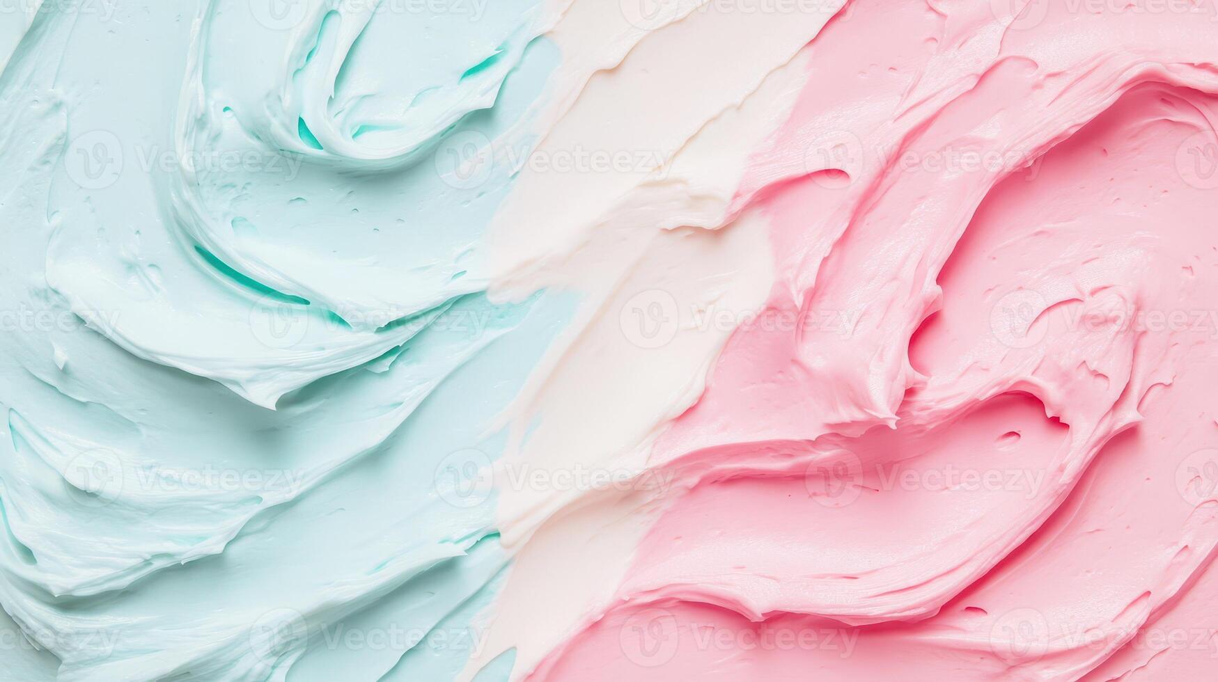 Swirls of pastel frosting on a baking surface photo
