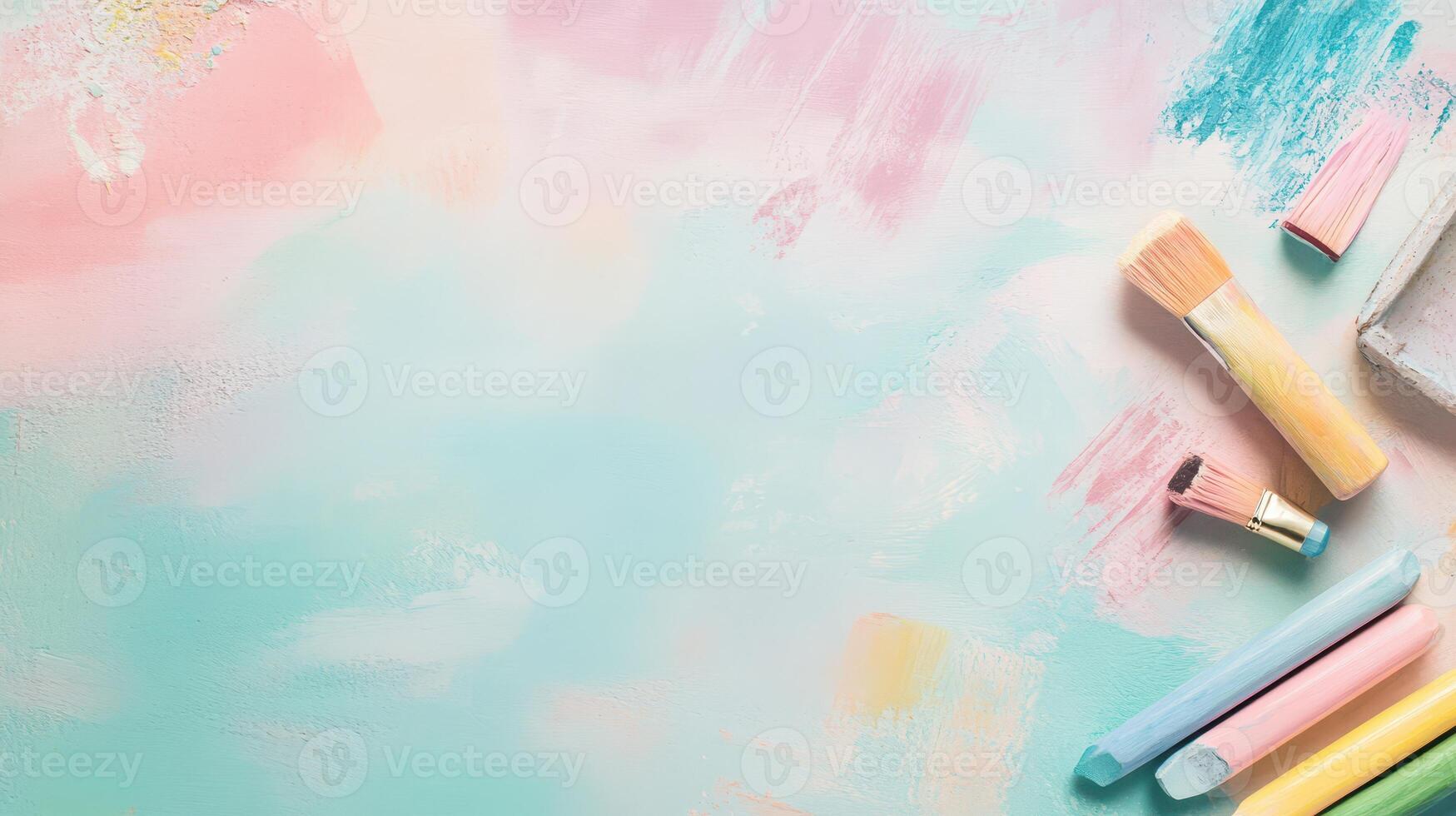 Bright art supplies on pastel backdrop photo