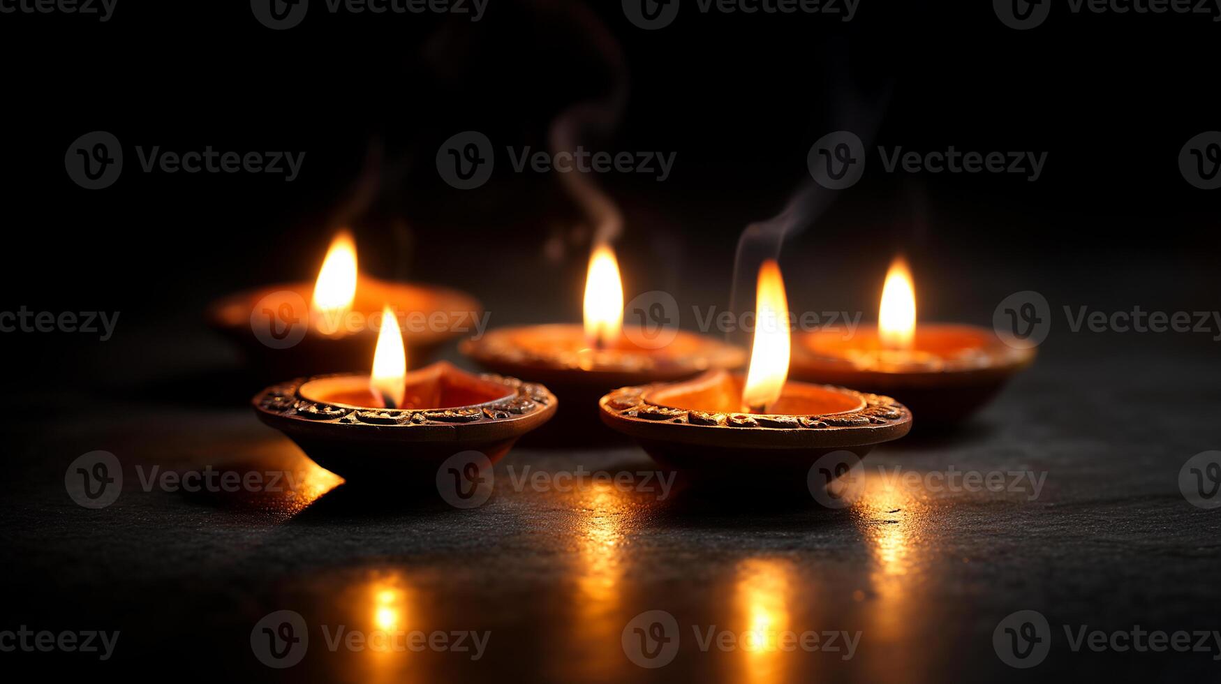 Holiday Preparation Lighting Diyas for Diwali Celebration Night photo