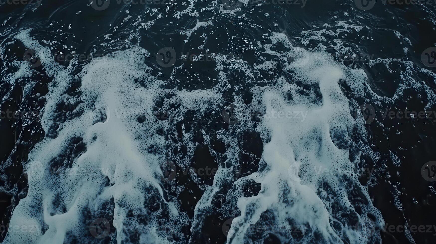 Turbulent Depths White Foam Cascading on Dark Waters Surface Abstract Ocean Scene photo