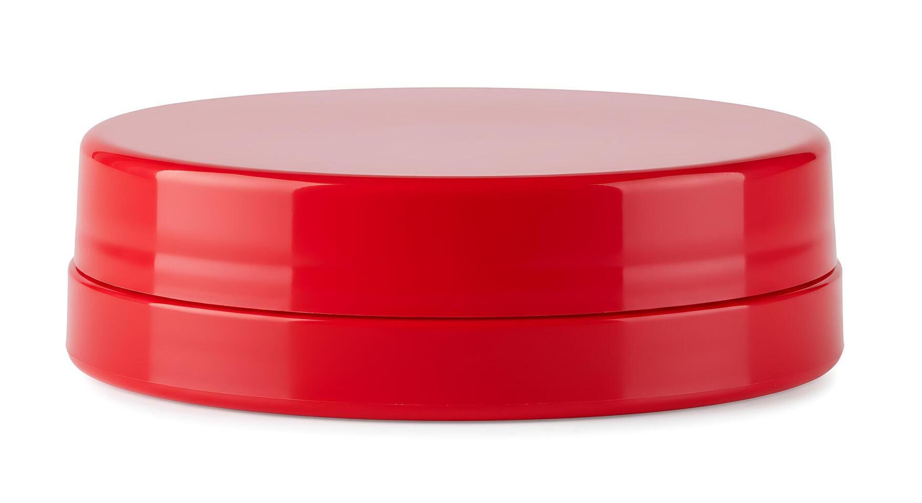 A red container with a lid on a white background photo