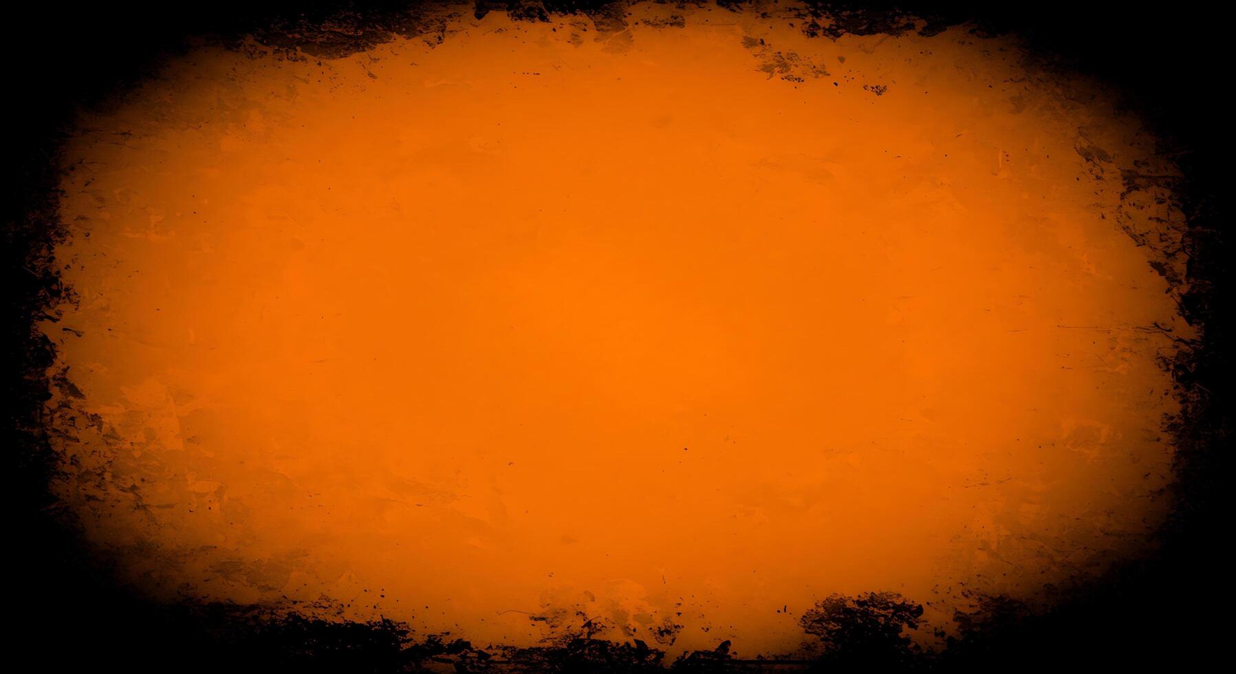 Orange grunge background with black background photo