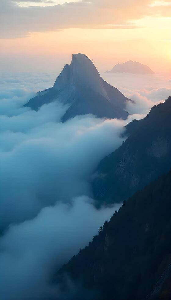 A mountain range is seen in the distance with clouds above photo