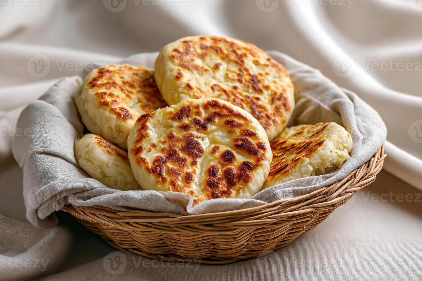 tempting bazlama in the cozy corner on a cream background, in a clean food photography style photo
