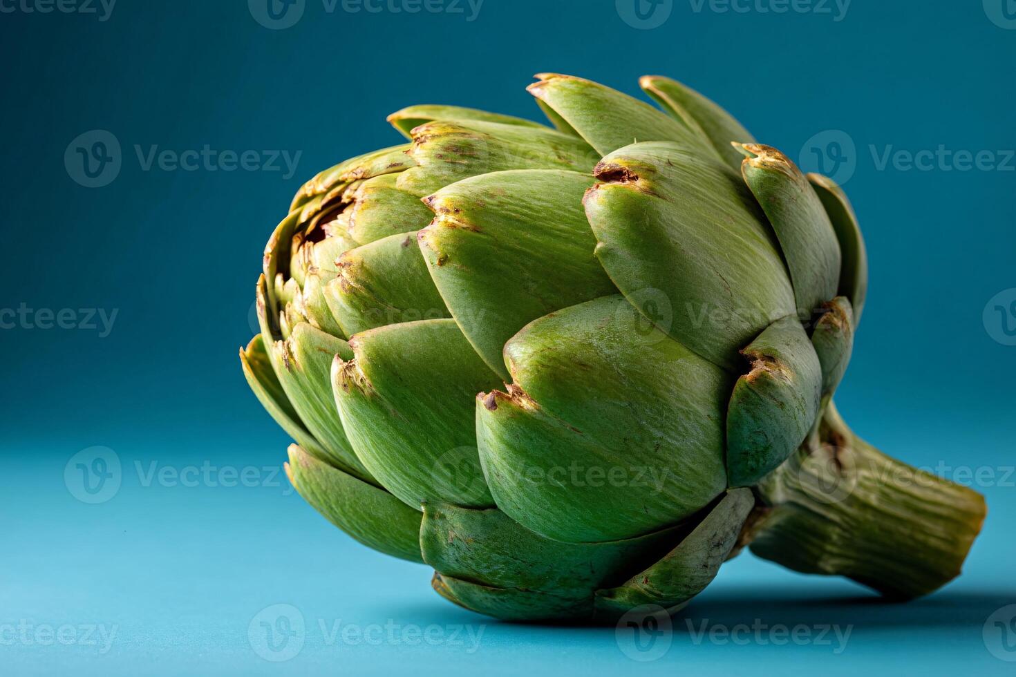 tempting artichoke in the minimalist corner on a pastel blue background photo