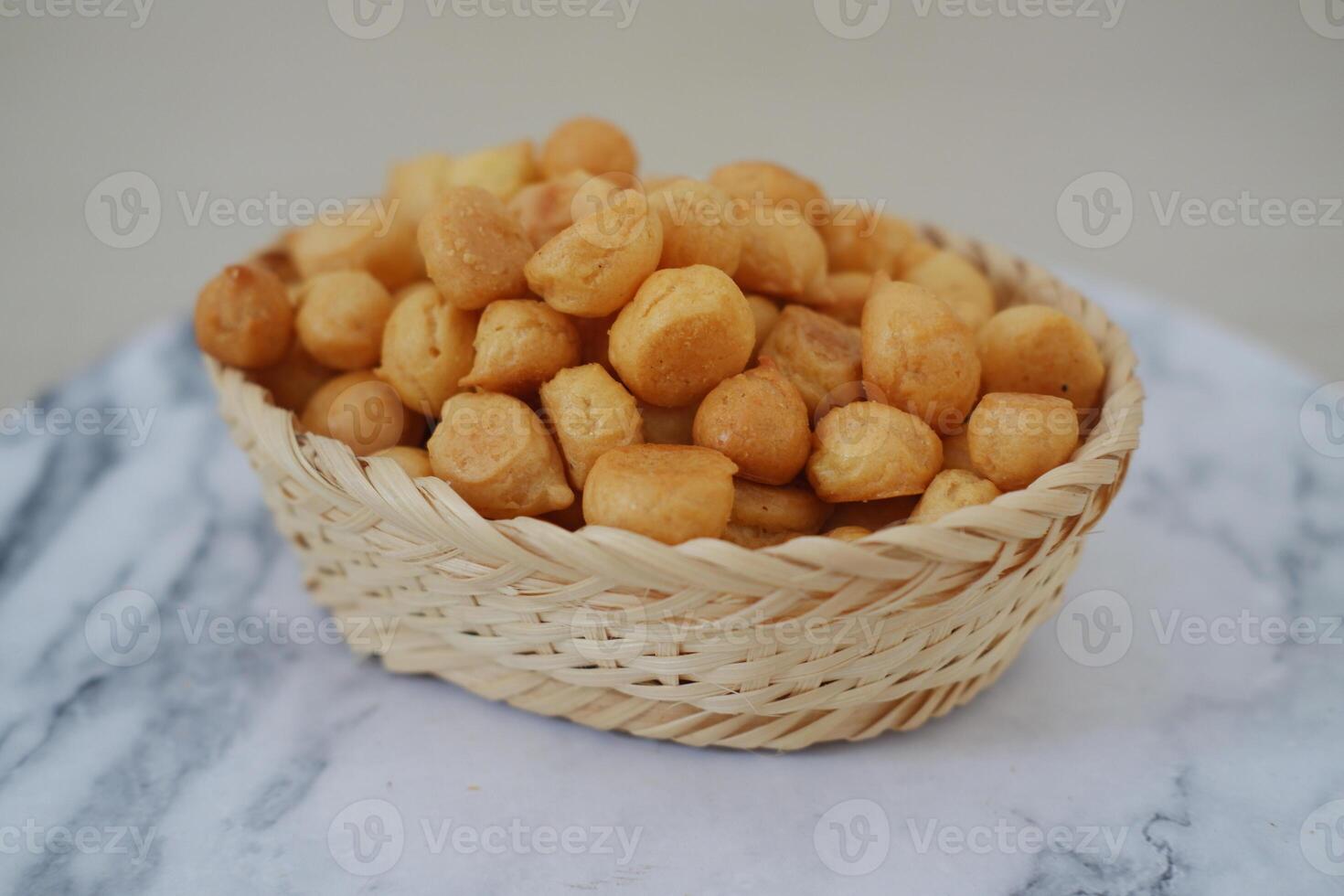 The snacks are uniform in size and appear to be deep-fried, giving them a crispy texture photo