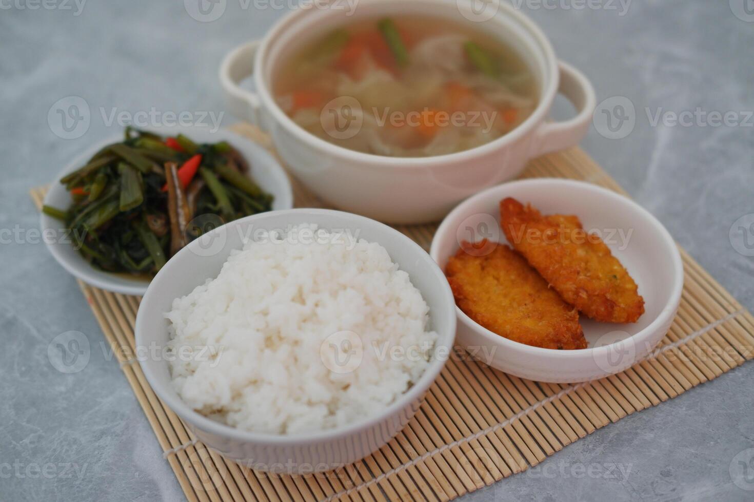 a traditional meal consisting of several dishes photo