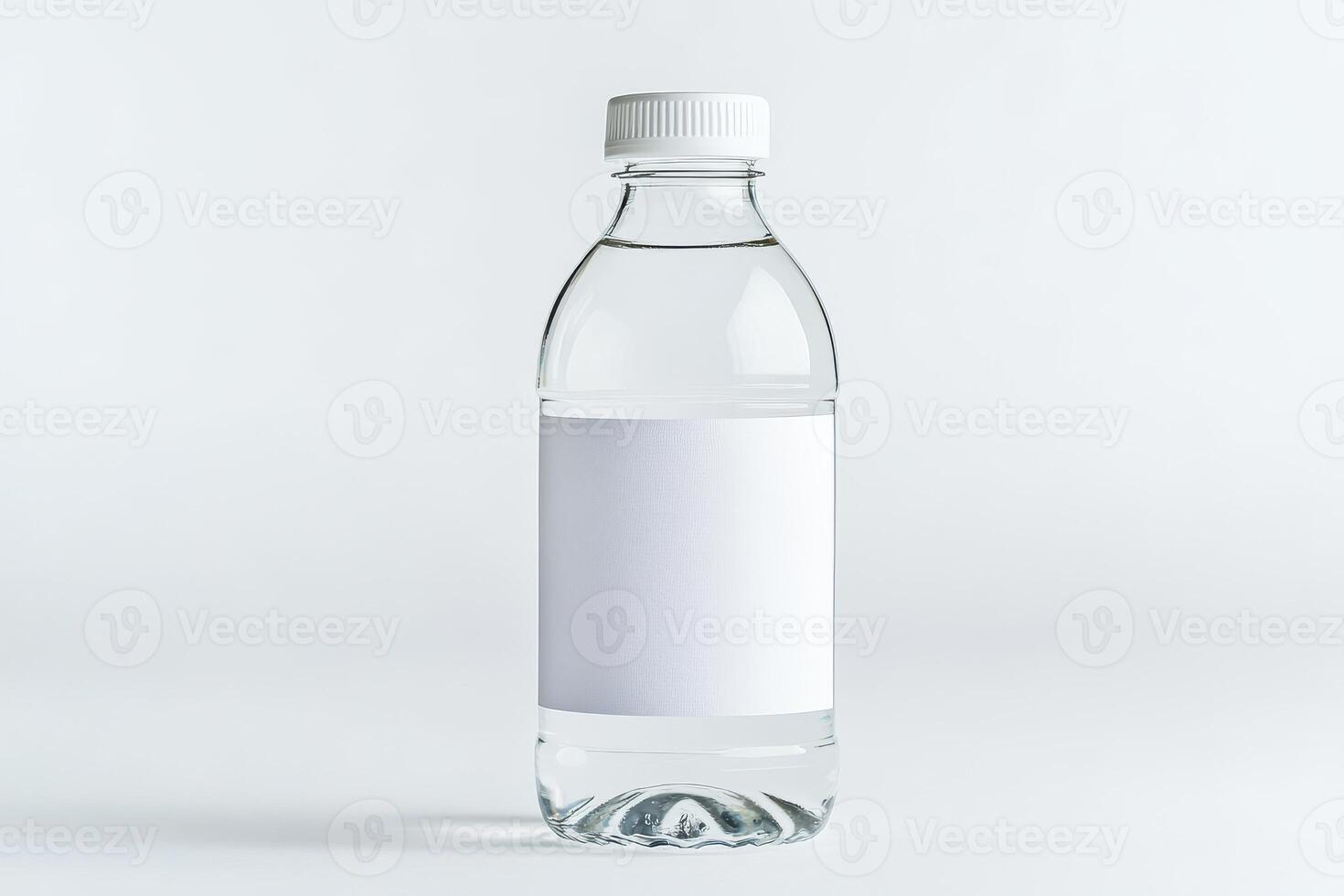 A clear plastic water bottle with blank white label for showcasing brand or product design isolated on white background photo