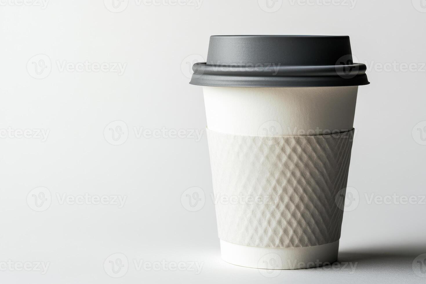 White paper coffee cup with gray lid isolated on white background with sharp details and minimalistic aesthetic photo