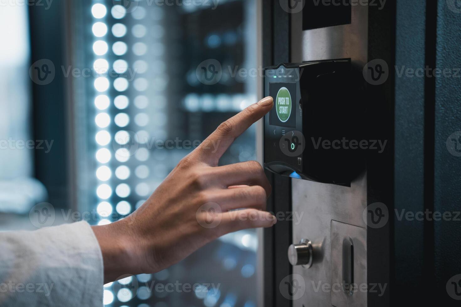 A person is touching a button on a door photo
