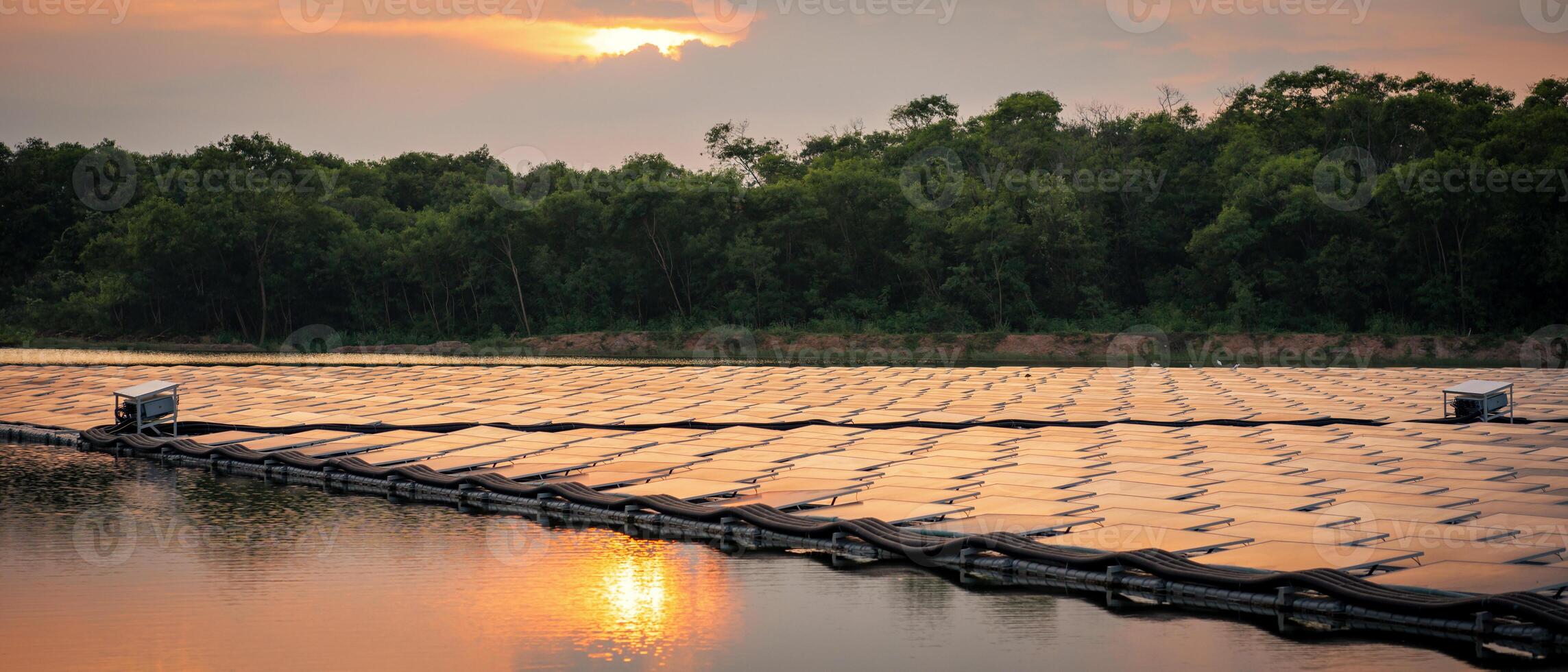 Solar panels on a floating platform in a river photo