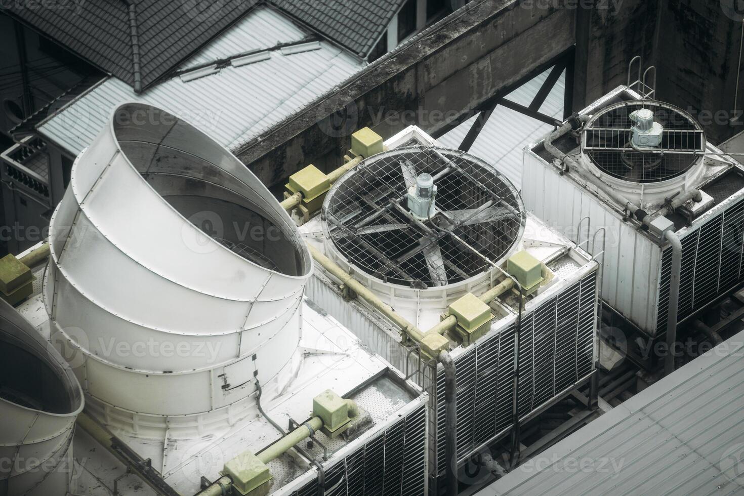 An aerial view of a building with several large pipes photo