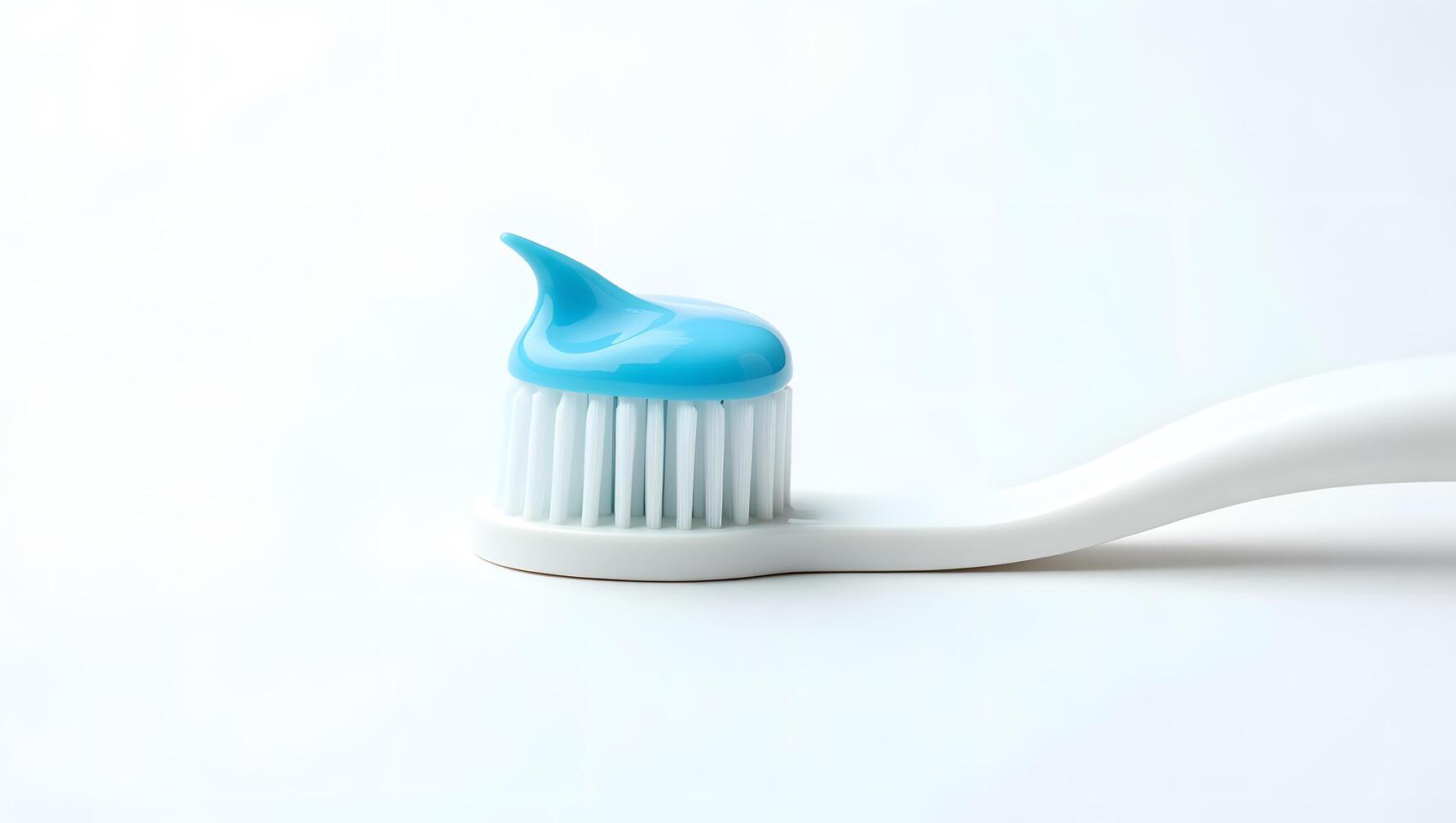 Blue Toothpaste on White Toothbrush Close-Up with Clean Minimal Background photo