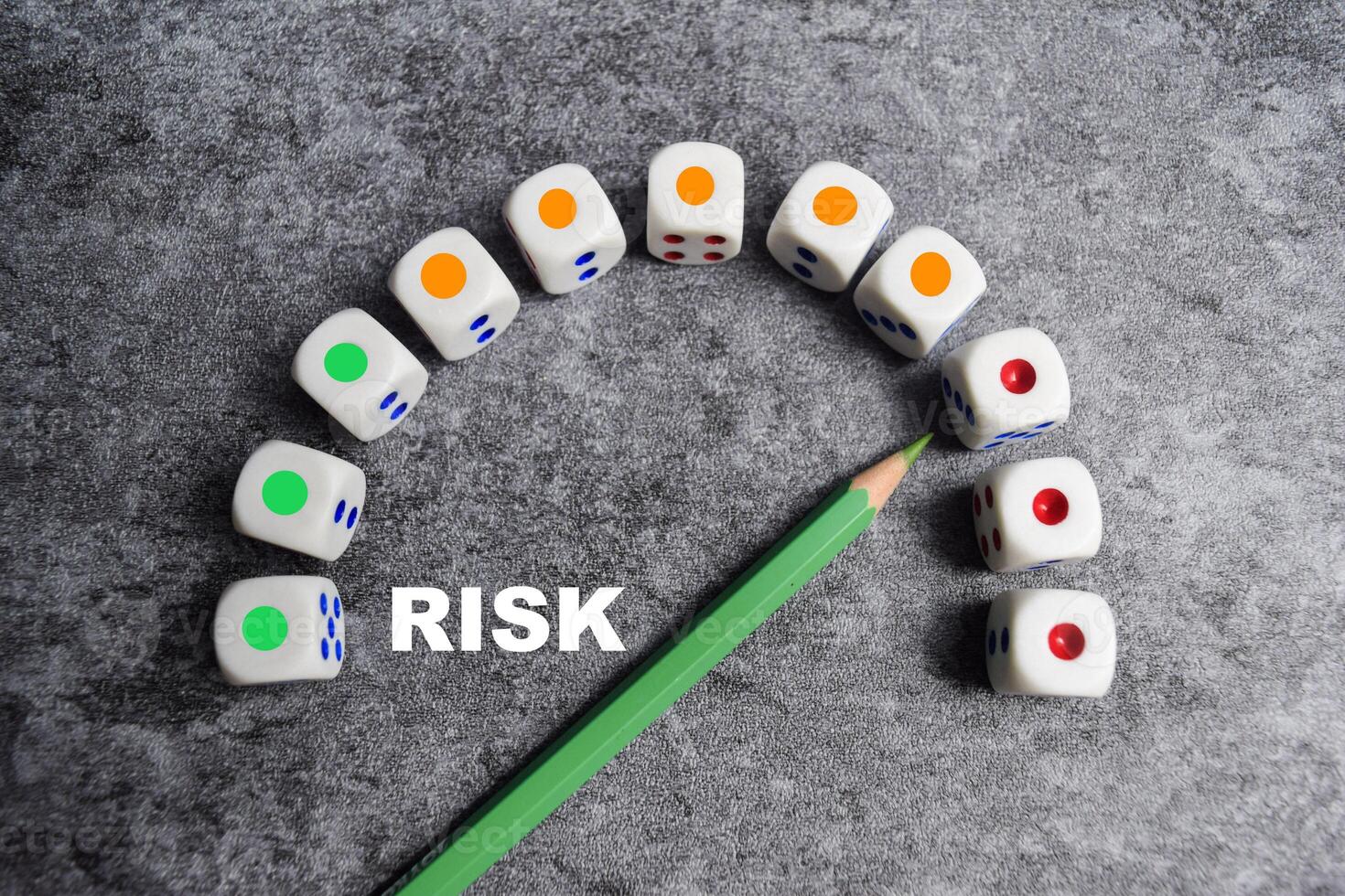 Risk level meter indicating high level of risk on dice photo