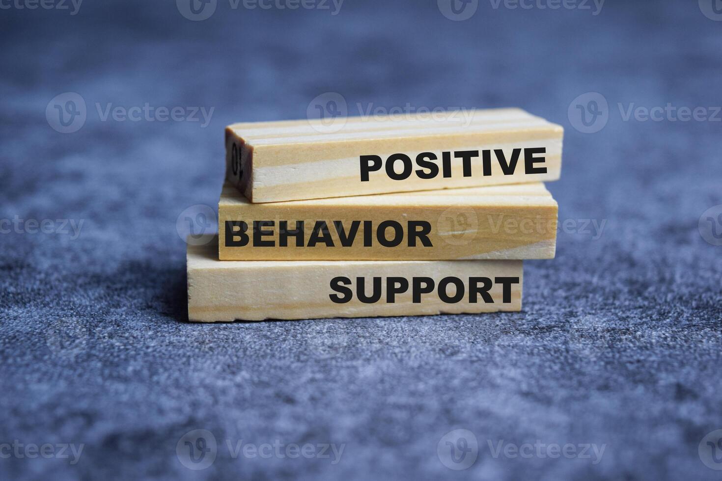 Concept of Positive behavior support Symbol. Wooden block with words Positive behavior support photo