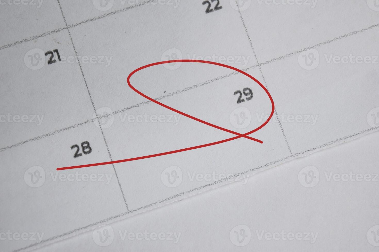 Focus on number 29 in calendar and emptyred ellipse. Save the date. Day of the year concept. photo
