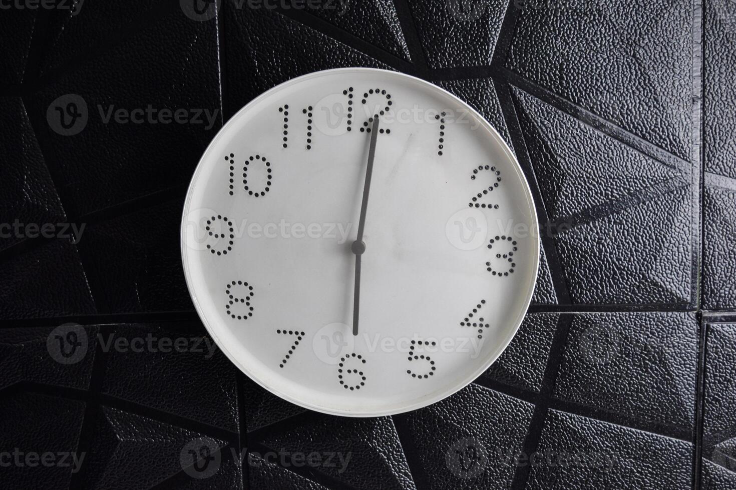 Focus time in clock of six o'clock for design in your business concept isolated on black background photo