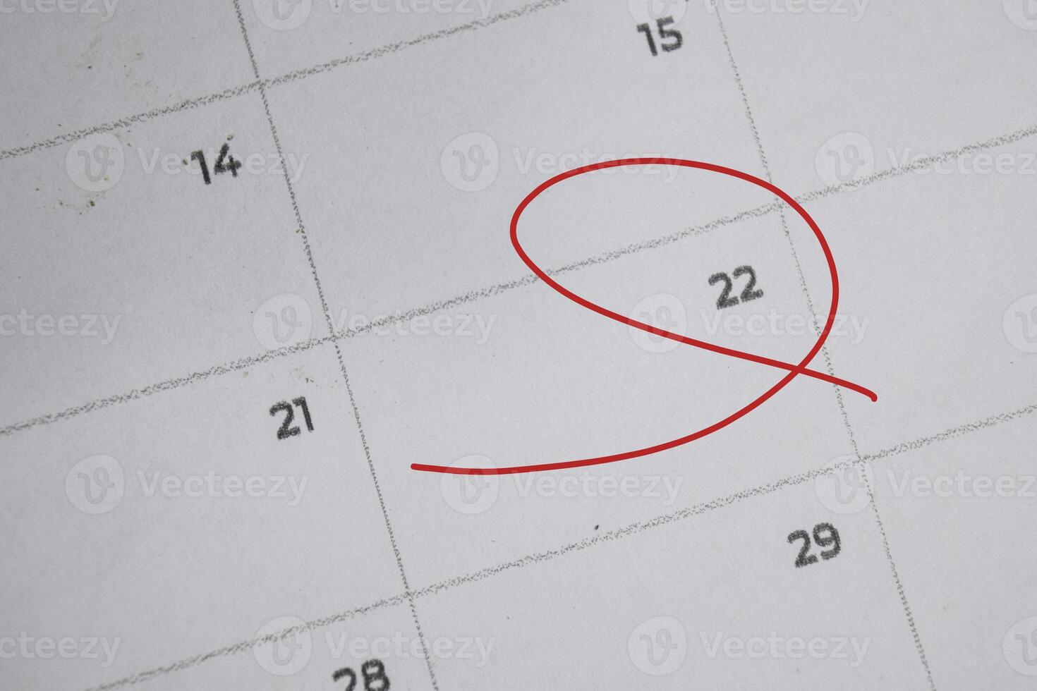 Focus on number 22 in calendar and emptyred ellipse. Save the date. Day of the year concept. photo